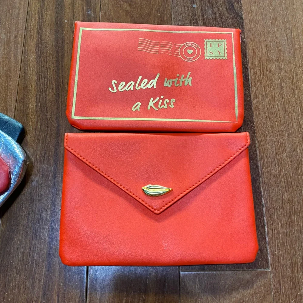 5 ipsy bags including spider web